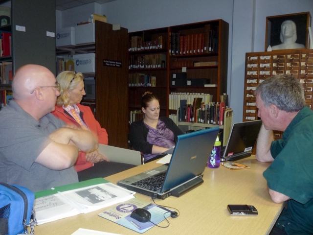 Paul, Barb, Sheri, Bill.  Discussing impact of the Danish on the university