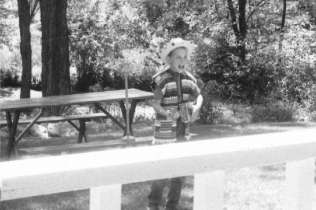 1970-ish - Skit program in front yard of Walt Konopacki home. Paul lip-synching to Roger Miller songs to audience sitting on porch.