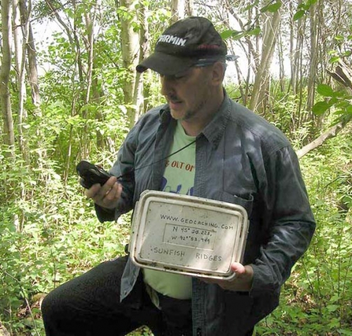 2004 - Found the Sunfish Ridges geocache. Holding the Garmin eTrex Vista GPS receiver.